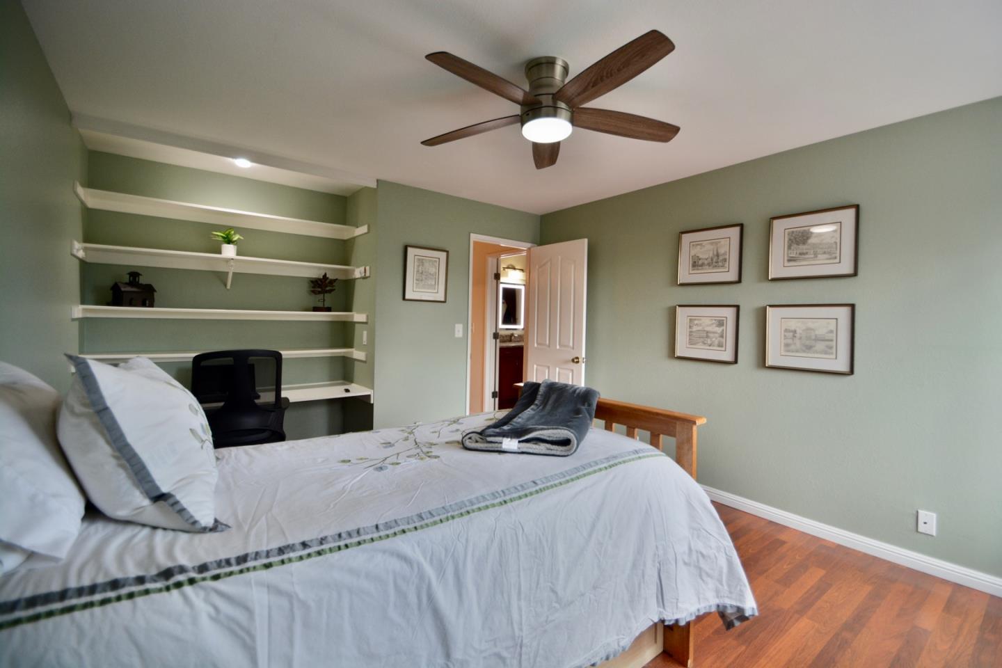 2298 Almaden Road, Unit A San Jose, CA 95125 - Photo 26 of 43 a bedroom with a bed and a chandelier