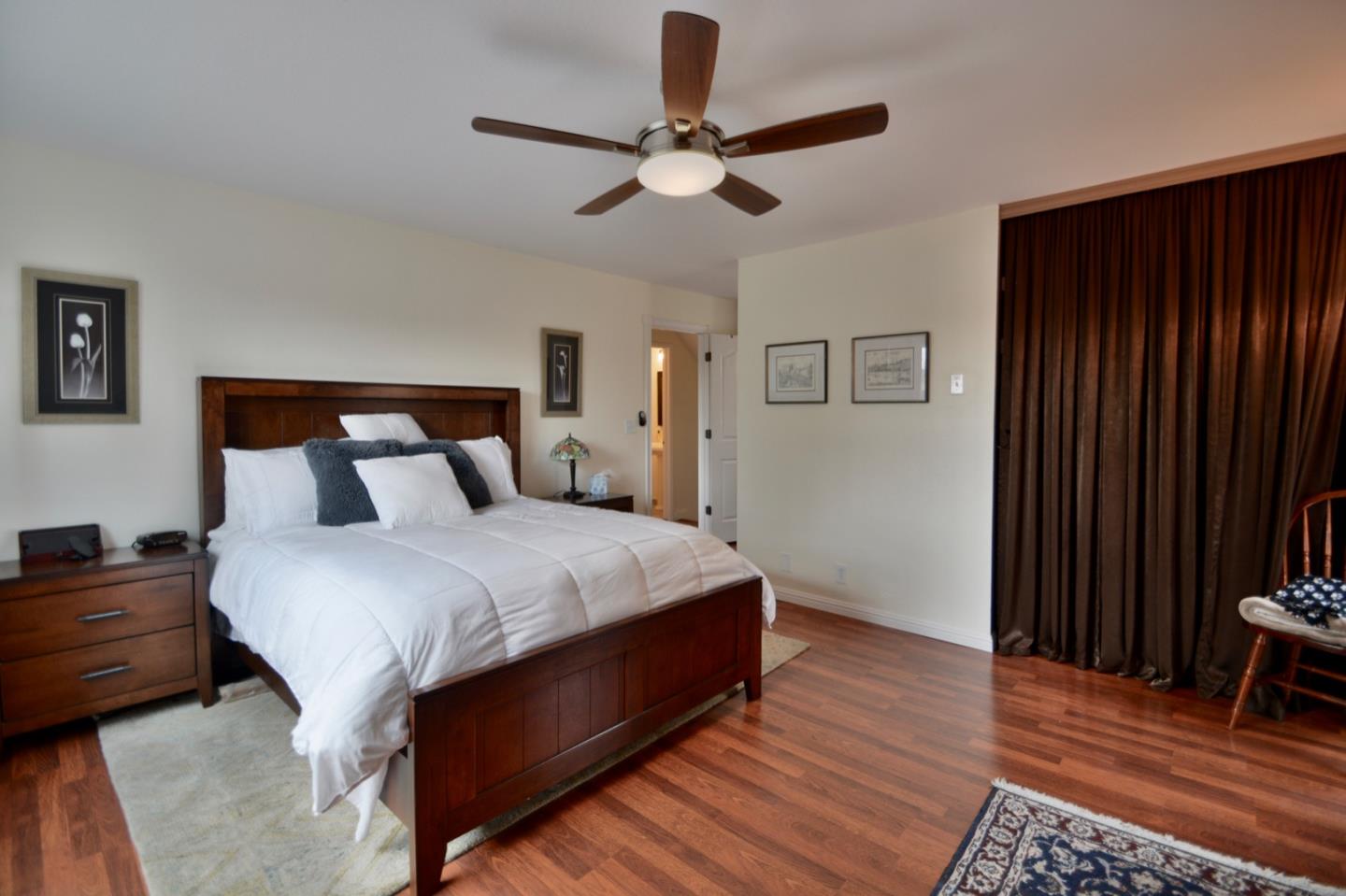 2298 Almaden Road, Unit A San Jose, CA 95125 - Photo 30 of 43 a bedroom with bed and wooden floor