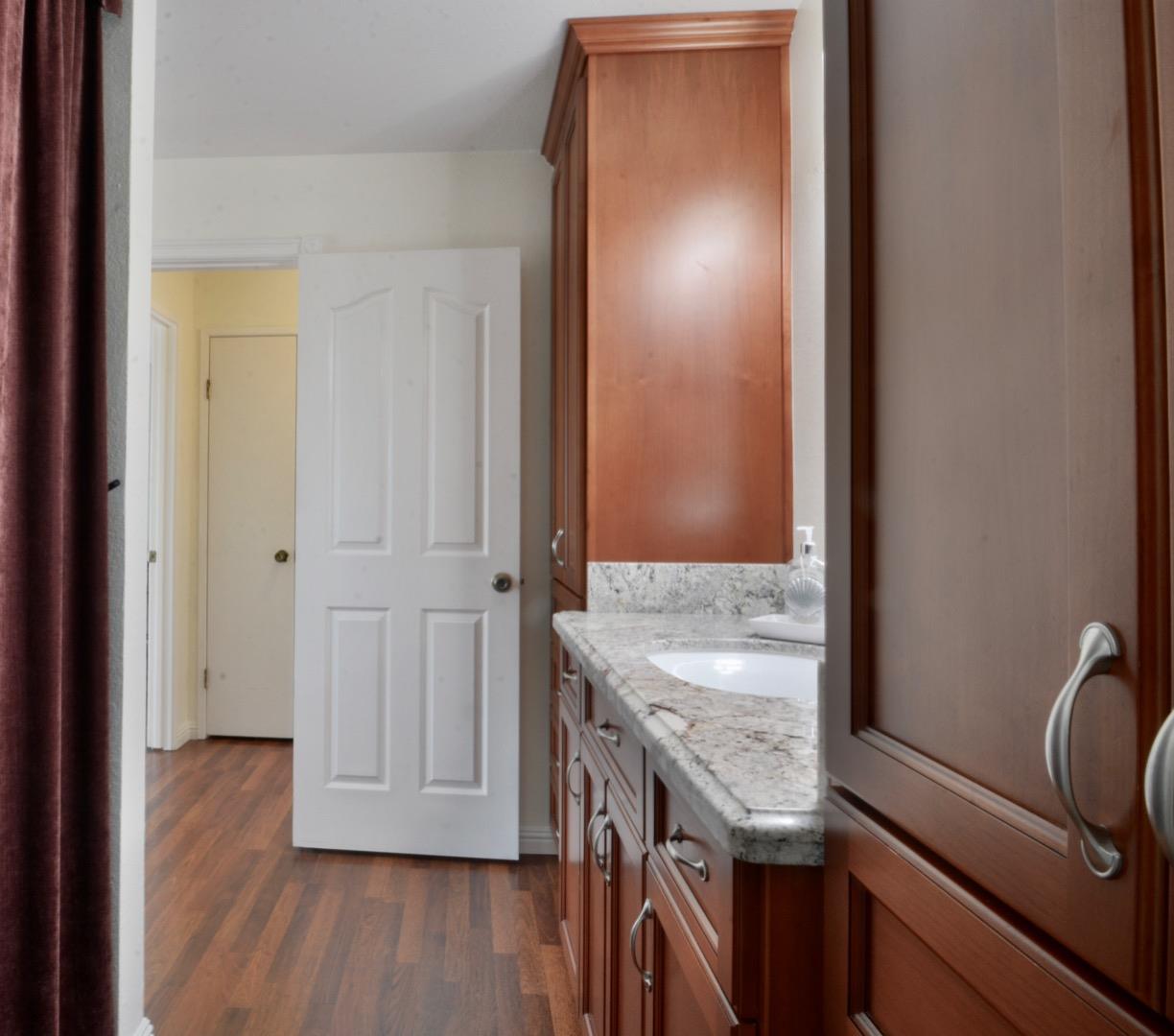 2298 Almaden Road, Unit A San Jose, CA 95125 - Photo 33 of 43 a bathroom with a granite countertop sink and a mirror