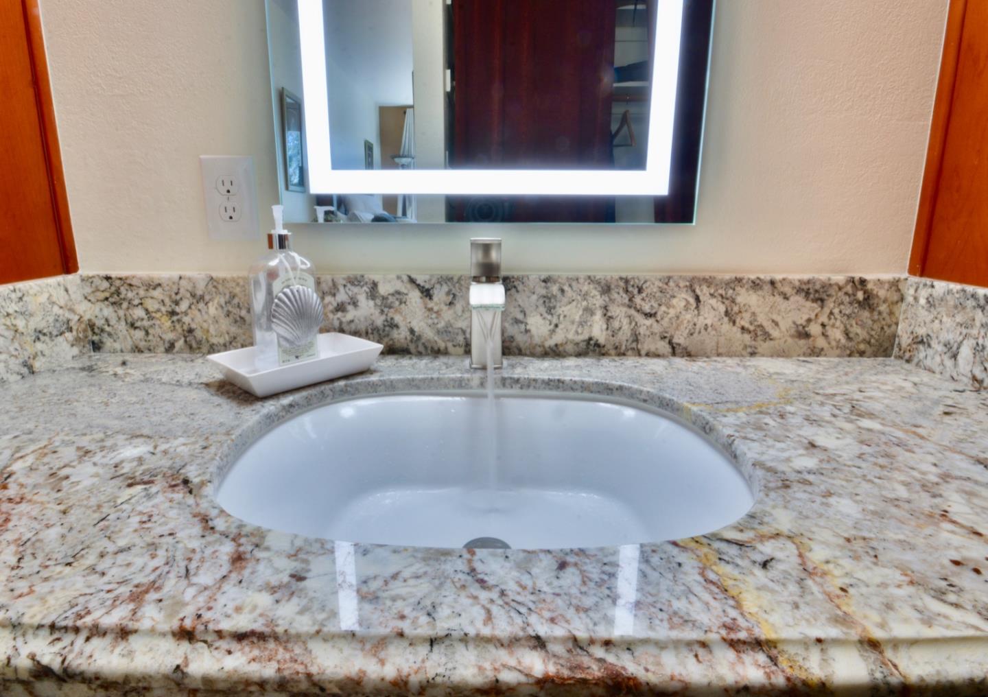 2298 Almaden Road, Unit A San Jose, CA 95125 - Photo 35 of 43 a bathroom with a granite countertop sink and a mirror