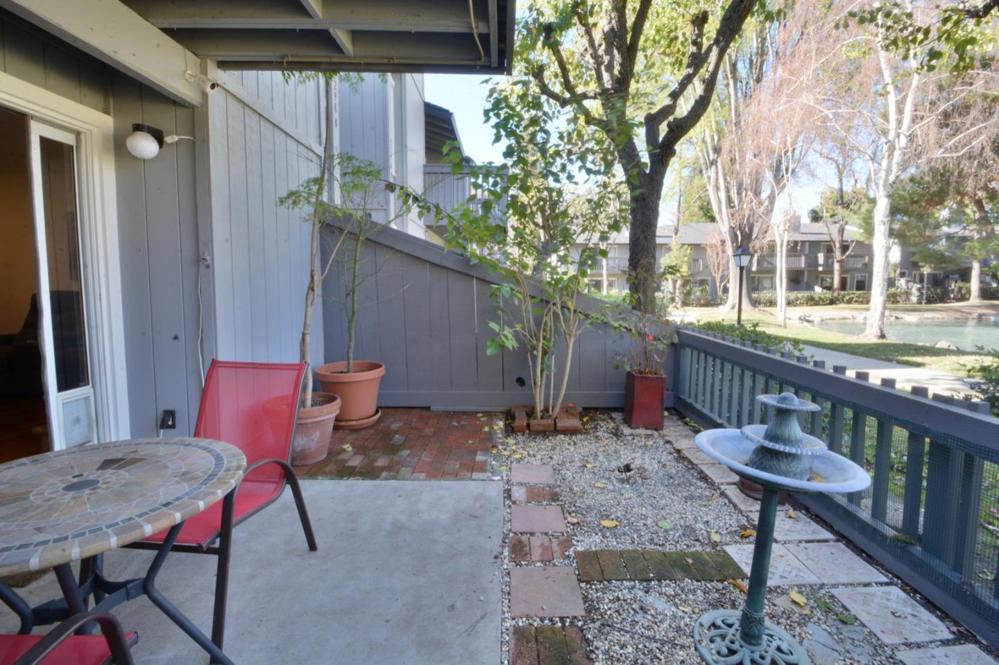 2298 Almaden Road, Unit A San Jose, CA 95125 - Photo 38 of 43 a backyard of a house with table and chairs