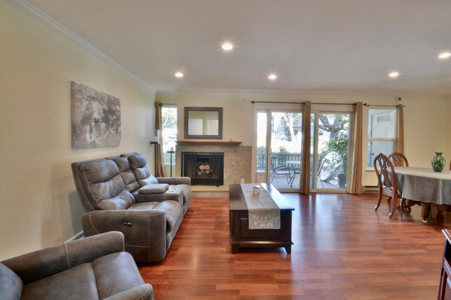 2298 Almaden Road, Unit A San Jose, CA 95125 - Photo 7 of 43 a living room with furniture fireplace and a table