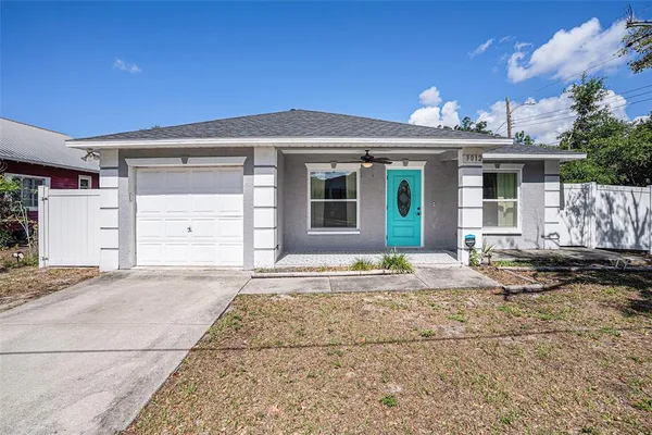 a view of a house with a snow in the yard