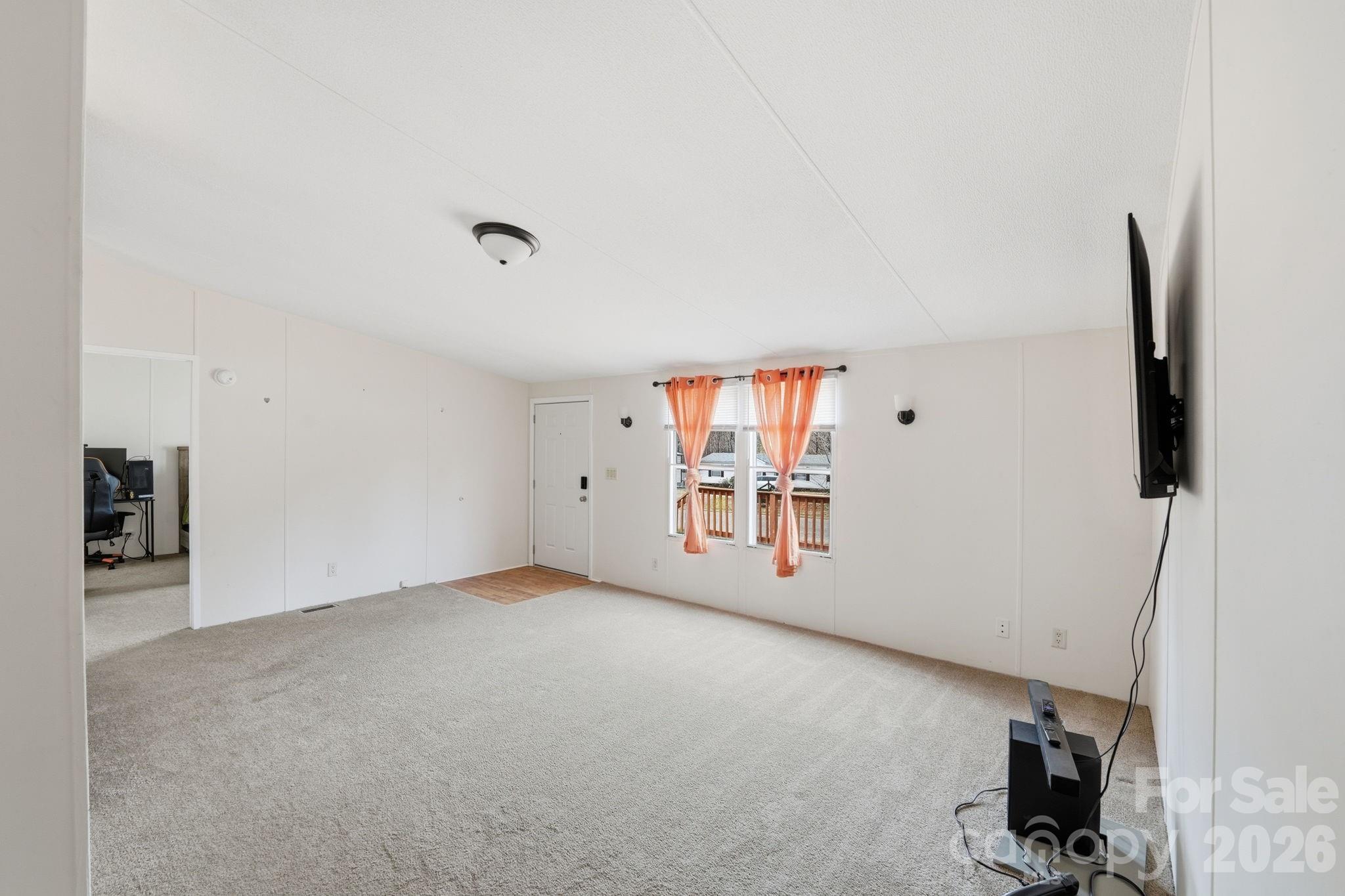 2862 Eagle Point Drive Trinity, NC 27370 - Photo 6 of 31 a view of an empty room with windows
