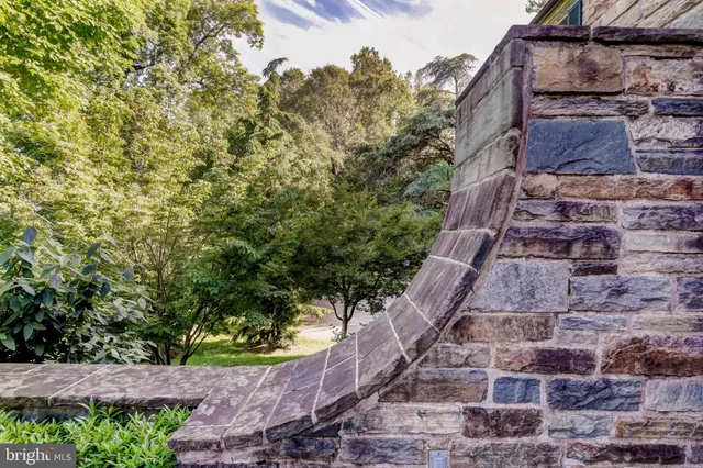 a view of a chairs and table in the patio
