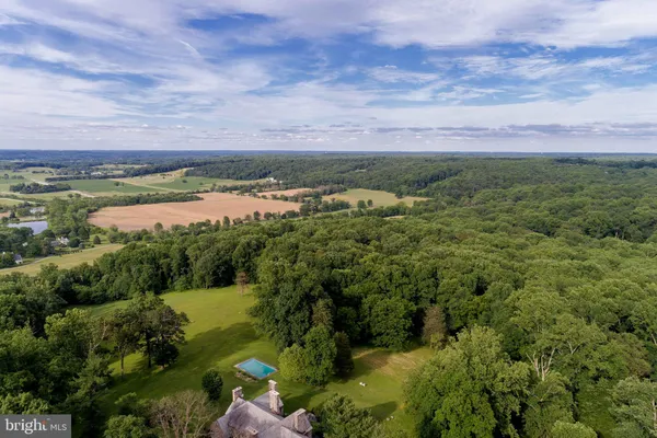 a view of a chairs and table in the patio