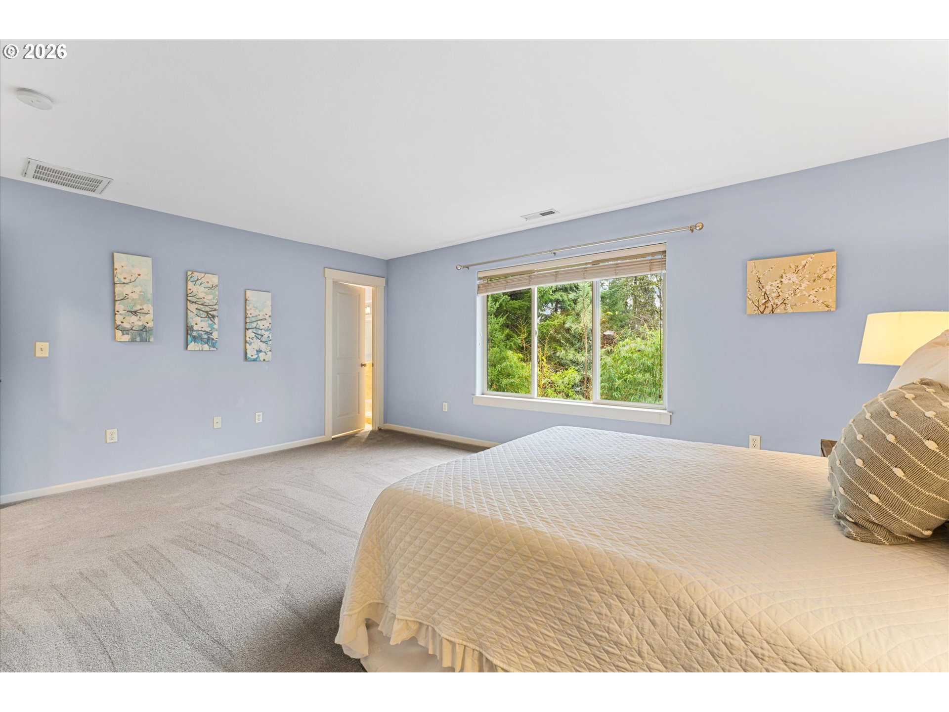 15680 Southwest 81st Avenue Tigard, OR 97224 - Photo 21 of 33 a bedroom with a bed and a window