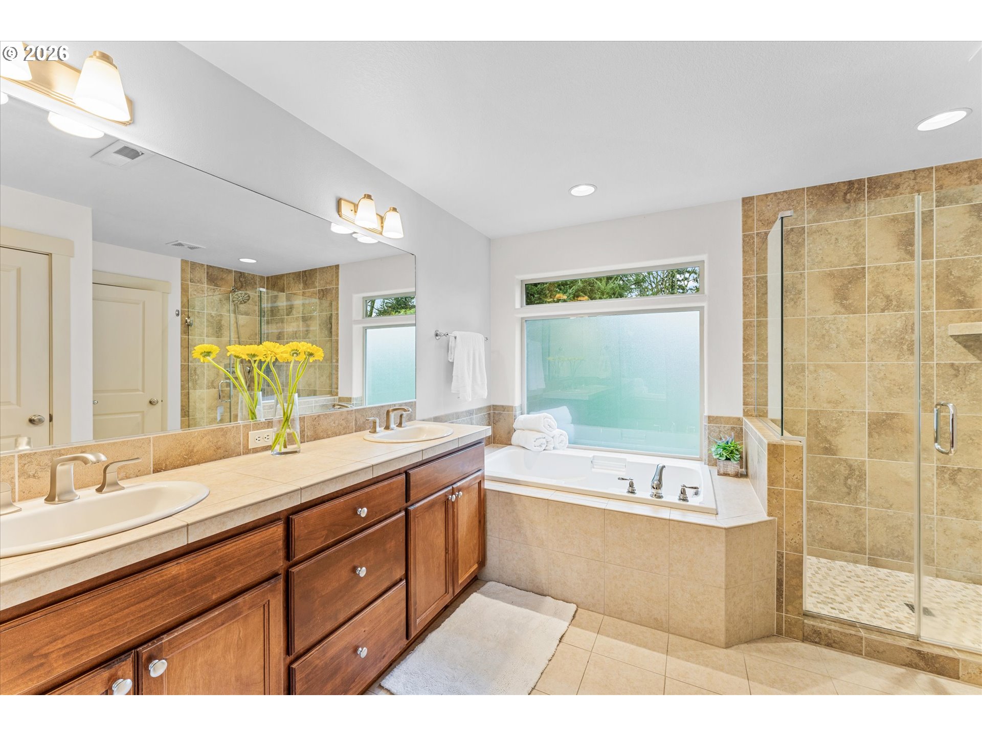 15680 Southwest 81st Avenue Tigard, OR 97224 - Photo 22 of 33 a bathroom with a large tub sink shower and mirror