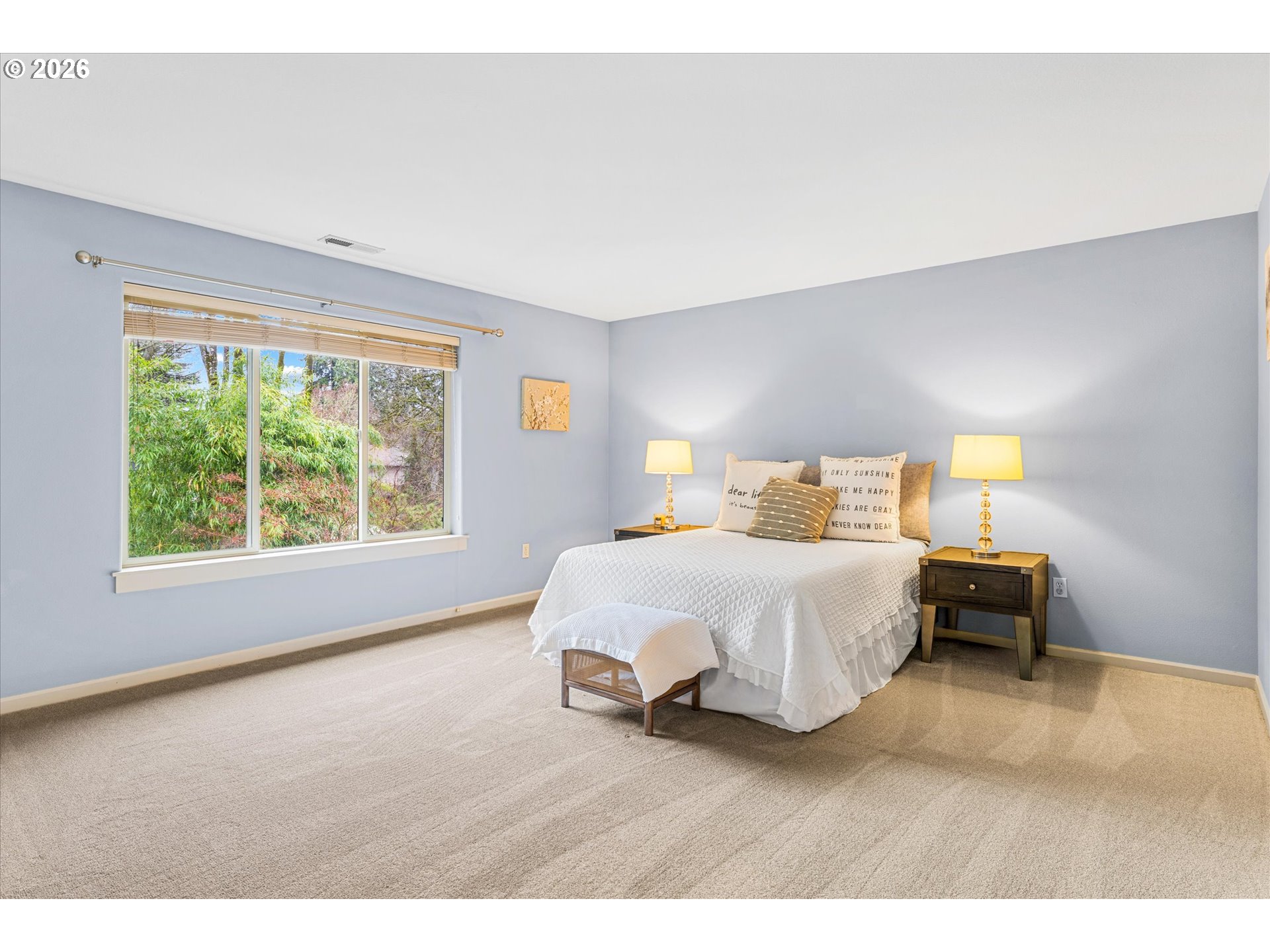 15680 Southwest 81st Avenue Tigard, OR 97224 - Photo 4 of 33 a bedroom with a bed and a large window