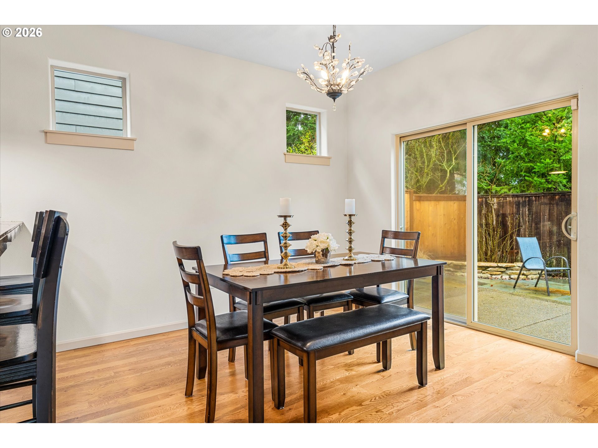 15680 Southwest 81st Avenue Tigard, OR 97224 - Photo 7 of 33 a view of a dining room with furniture and wooden floor