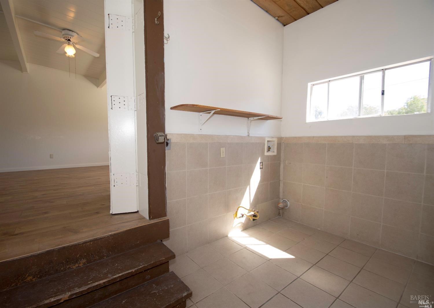 701 Corlano Avenue Santa Rosa, CA 95404 - Photo 10 of 22 Laundry Area leading to attached 2 car Garage