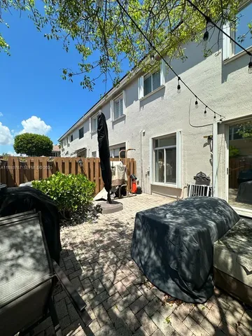 a view of a porch with furniture