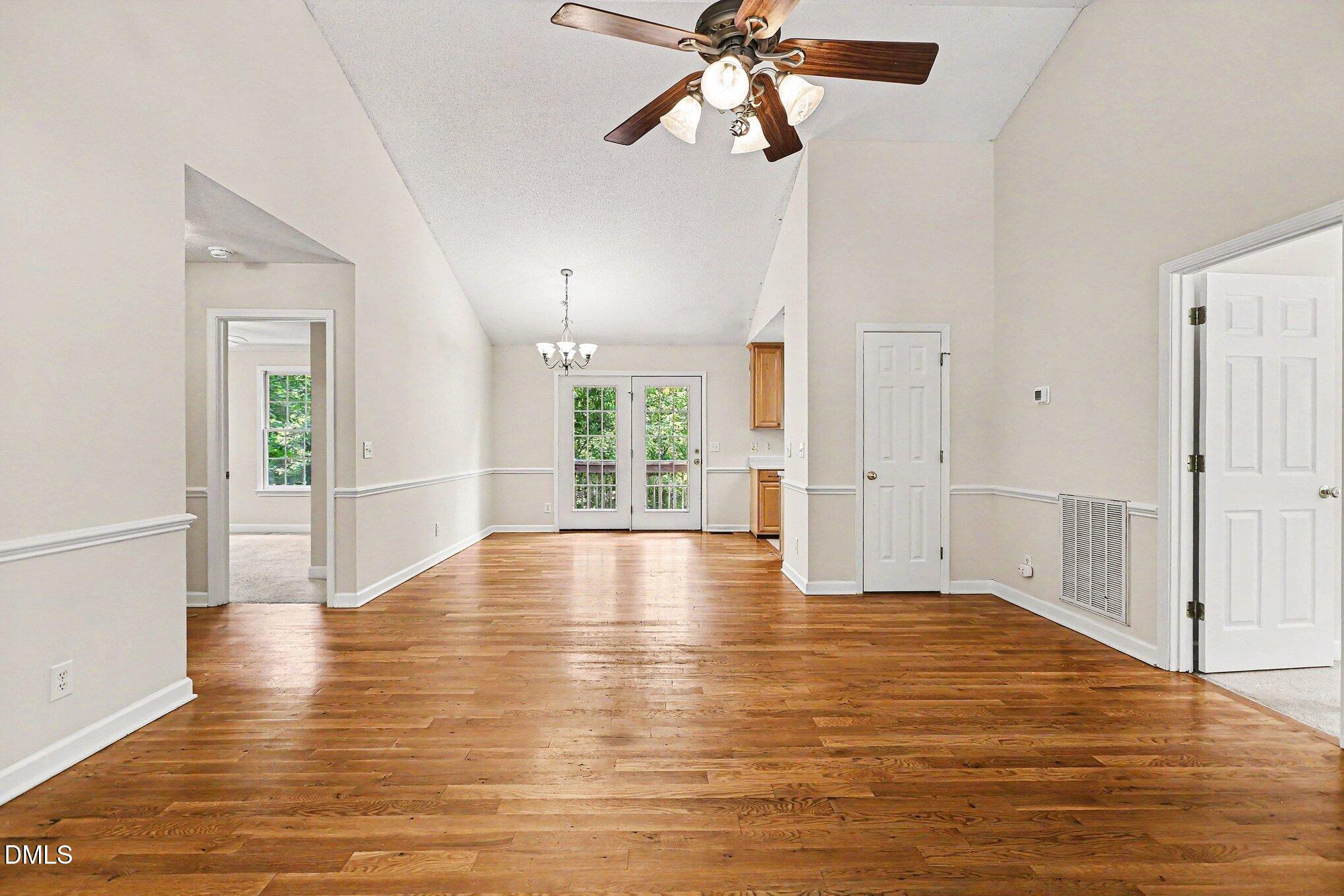 5359 Bass Mountain Road Snow Camp, NC 27349 - Photo 17 of 25 a view of empty room with wooden floor and fan