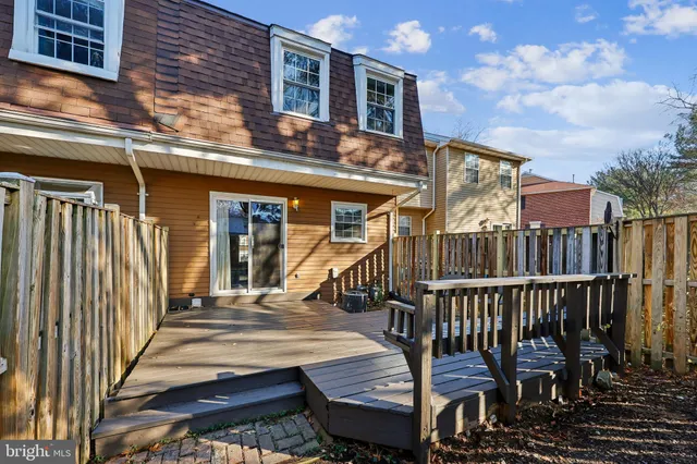 a front view of a house with a porch