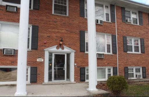 a front view of a multi story residential apartment building