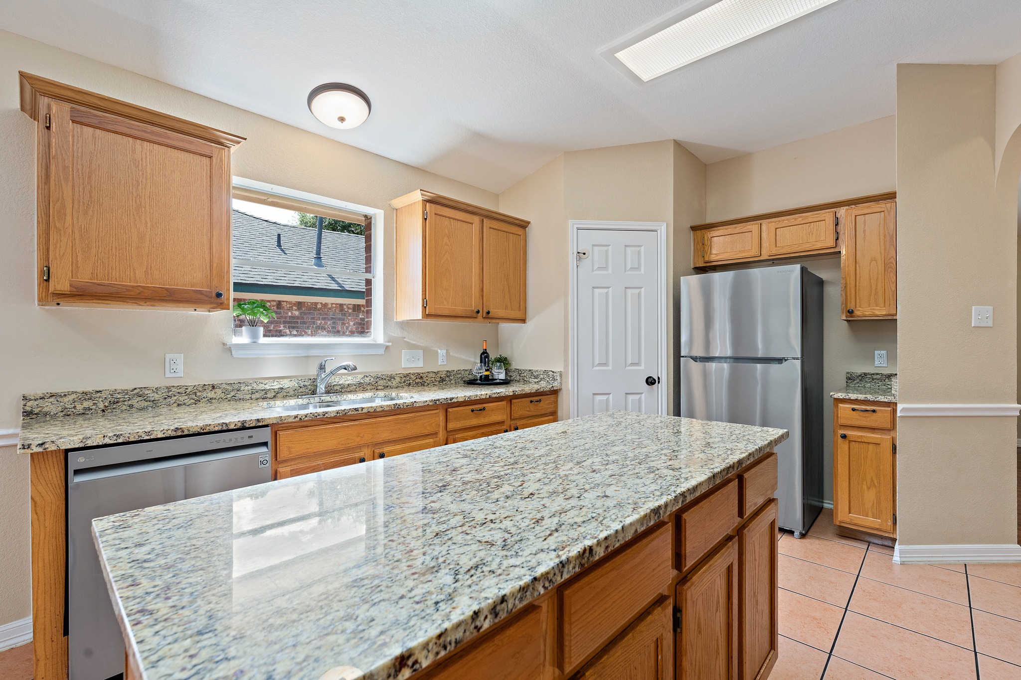1208 Lochaline Loop Pflugerville, TX 78660 - Photo 14 of 40 Gorgeous Granite Counters and yes, there's a Pantry