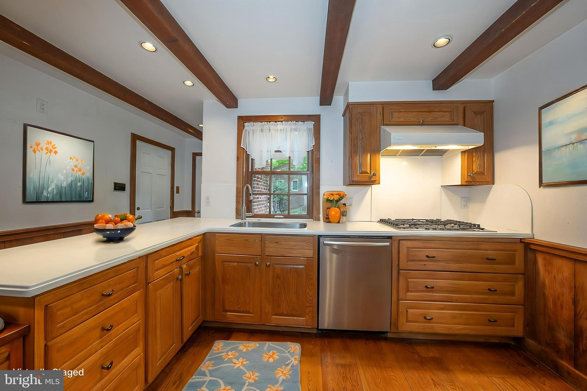 577 Tory Hill Road Devon, PA 19333 - Photo 9 of 63 Kitchen with Beamed Ceiling and Hardwood Flooring