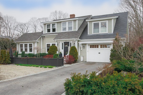10 Bridge Street Hamilton, MA 01982 - Photo 1 of 30 a front view of a house with a garden