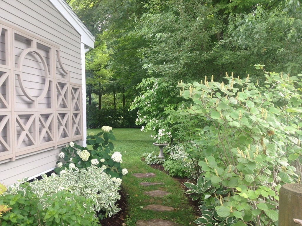 10 Bridge Street Hamilton, MA 01982 - Photo 26 of 30 a backyard of a house with lots of green space
