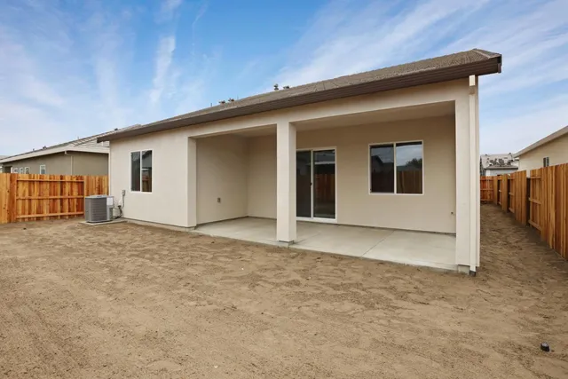 a view of house with garage