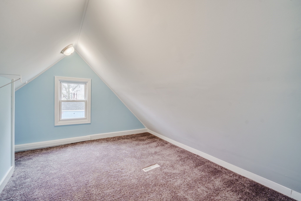 174 Allen Street Springfield, MA 01108 - Photo 20 of 37 an empty room with a window