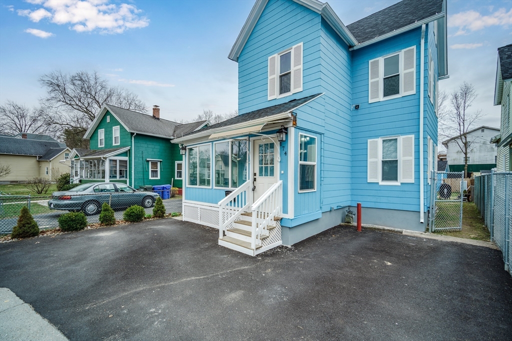 174 Allen Street Springfield, MA 01108 - Photo 2 of 37 a view of a house with backyard porch and sitting area