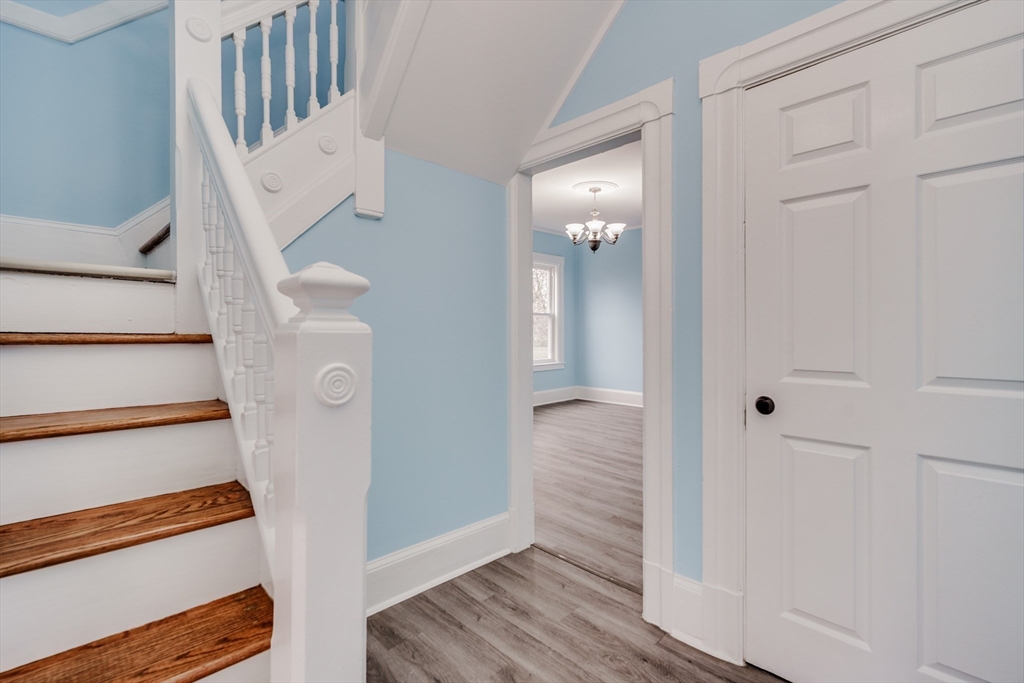 174 Allen Street Springfield, MA 01108 - Photo 25 of 37 a view of entryway with wooden floor and staircase