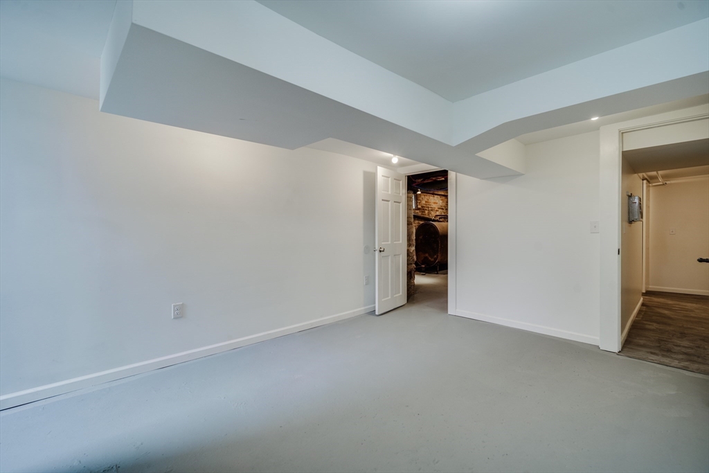 174 Allen Street Springfield, MA 01108 - Photo 27 of 37 an empty room with an empty space and closet area