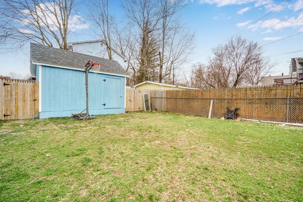 174 Allen Street Springfield, MA 01108 - Photo 31 of 37 a backyard of a house