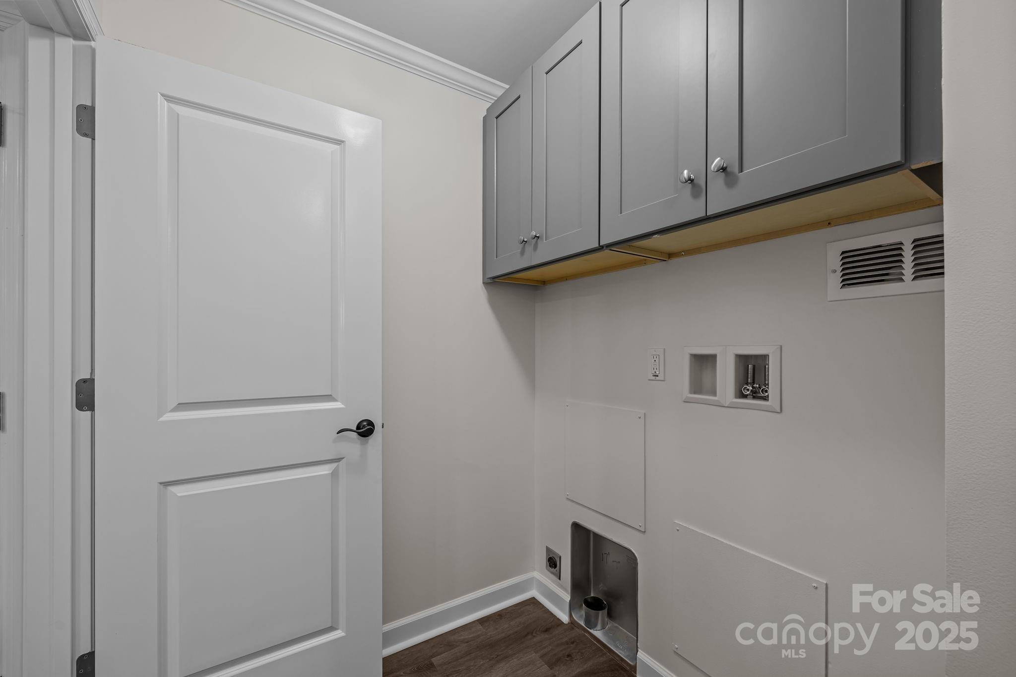 215 McCoy Cove Road Black Mountain, NC 28711 - Photo 23 of 42 a view of storage and utility room with washer and dryer