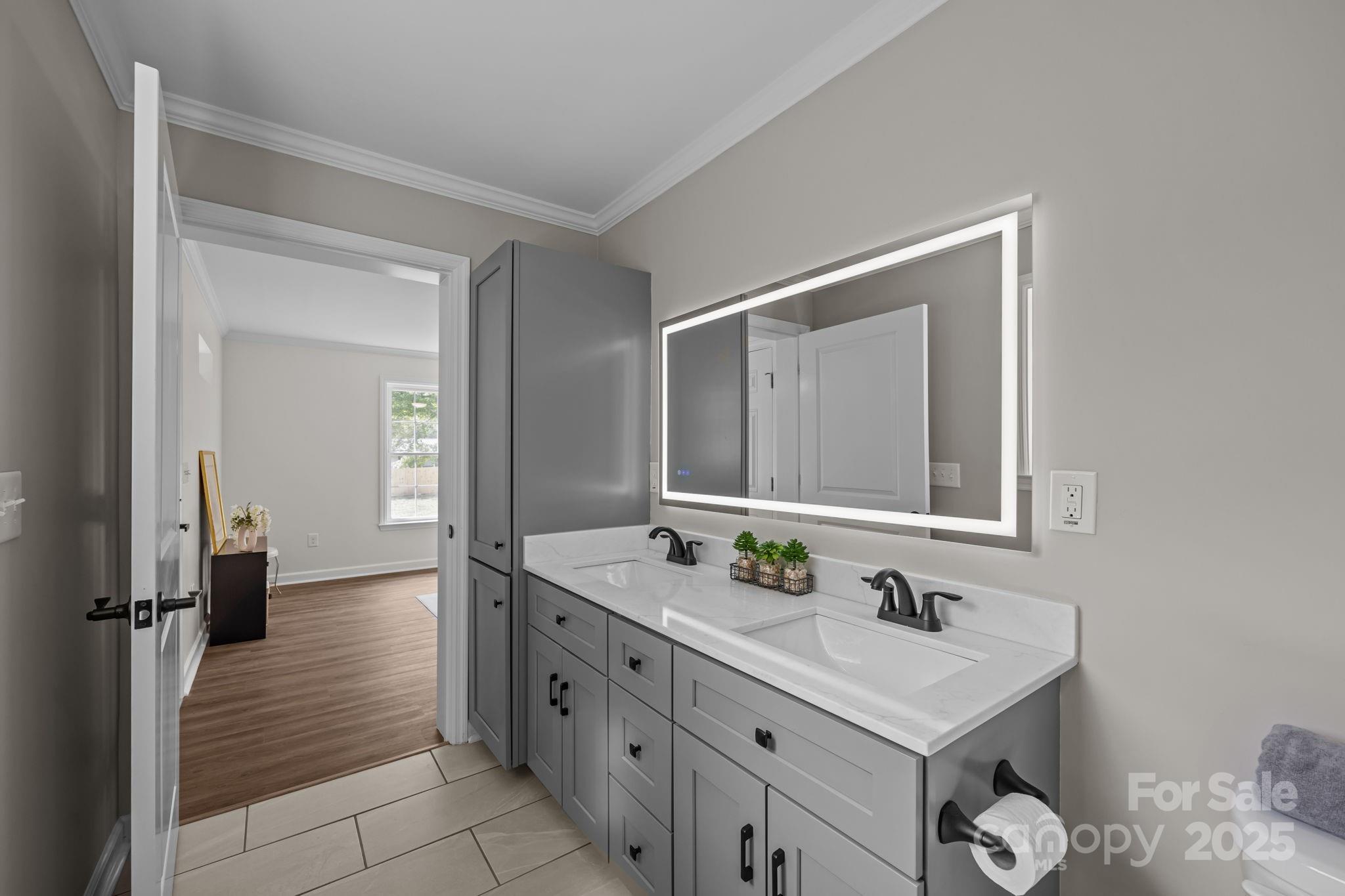 215 McCoy Cove Road Black Mountain, NC 28711 - Photo 33 of 42 a bathroom with a sink and a mirror