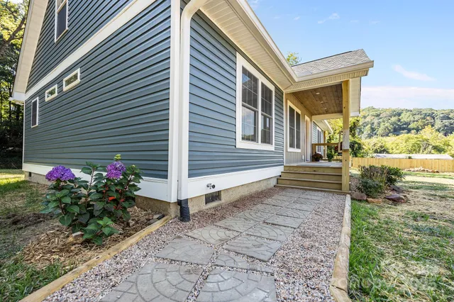 a house view with a backyard space