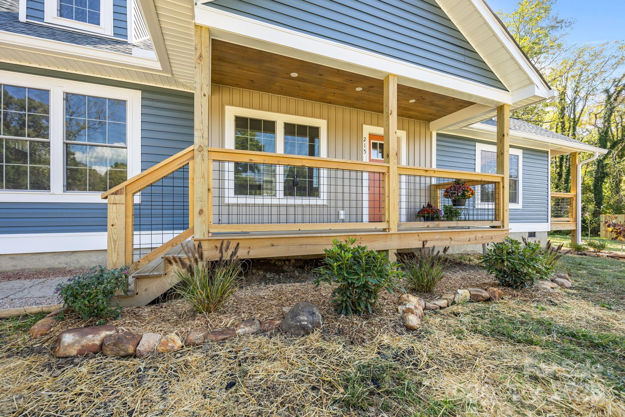 215 McCoy Cove Road Black Mountain, NC 28711 - Photo 7 of 42 a house view with a backyard