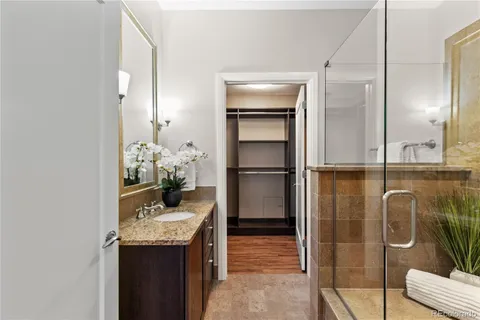 a kitchen with a refrigerator and countertop