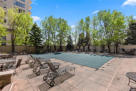 a view of a backyard with sitting area