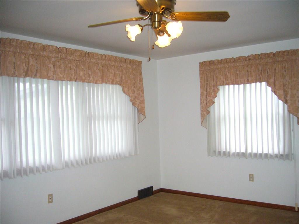 174 North Branch Road Monaca, PA 15061 - Photo 3 of 16 Another view of the living room, sheers that are attached to the blinds!
