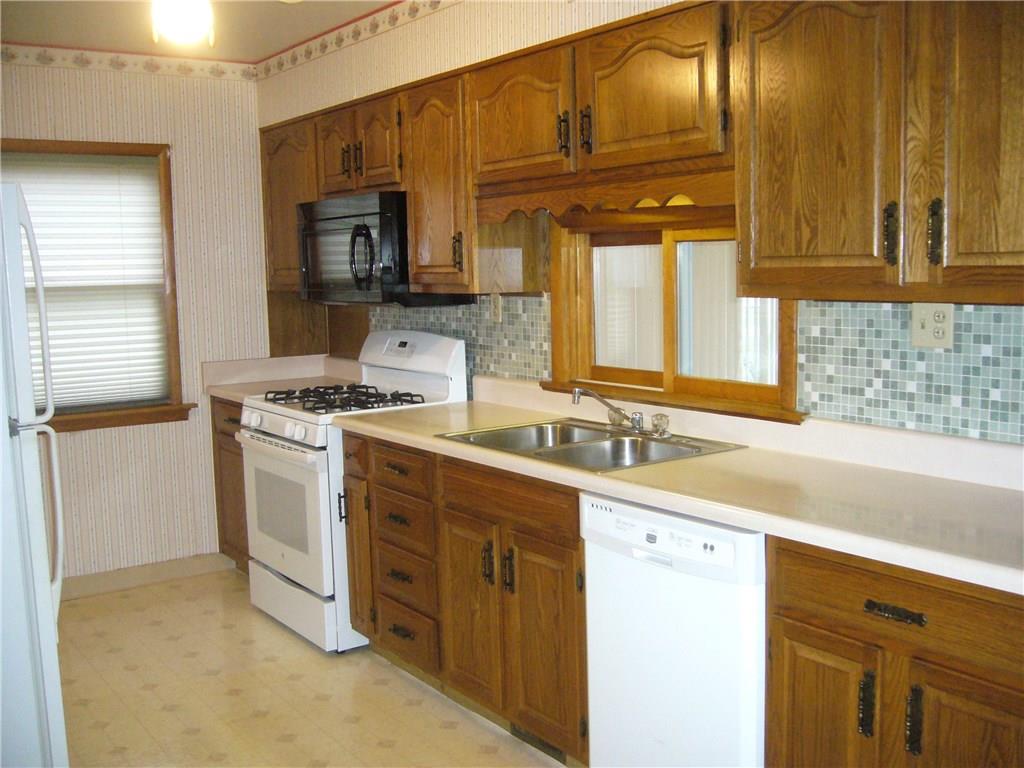 174 North Branch Road Monaca, PA 15061 - Photo 4 of 16 Large eat in kitchen with separate area for dining.