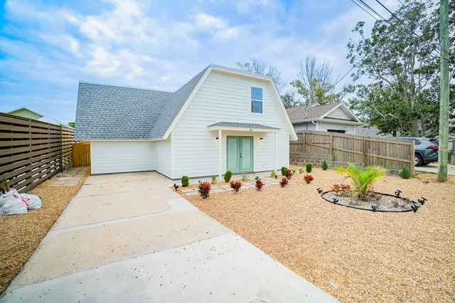 a view of a chairs and tables in the patio