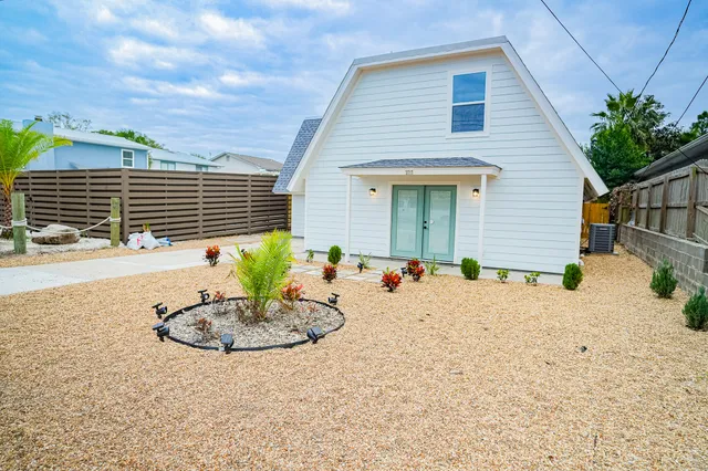 a view of a house with a garage