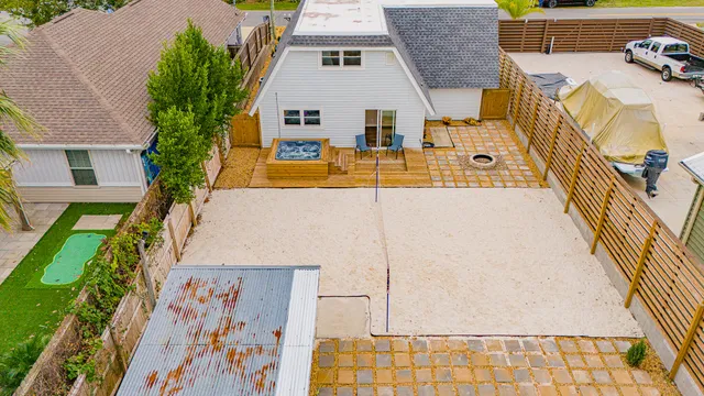 an aerial view of a house with swimming pool