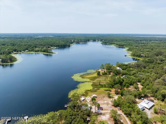 a view of a lake with a city