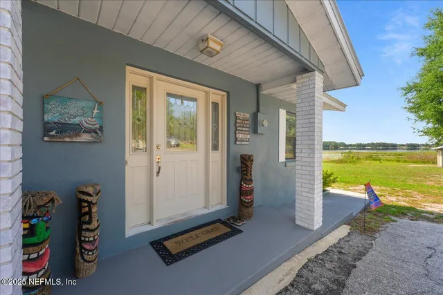a front view of a house with ocean view