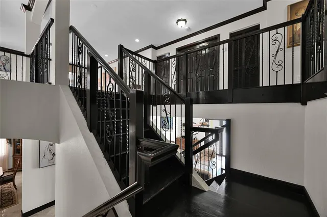 an aerial view of house with yard and lake view