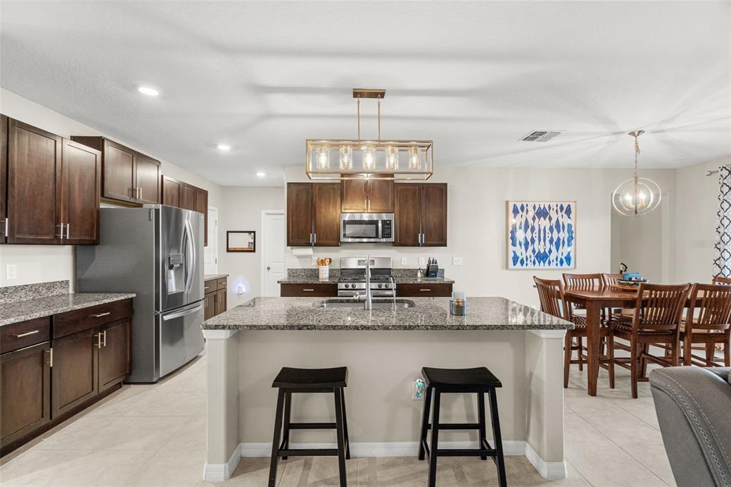 9823 Lemon Drop Loop Ruskin, FL 33573 - Photo 8 of 56 Gallery Image 8