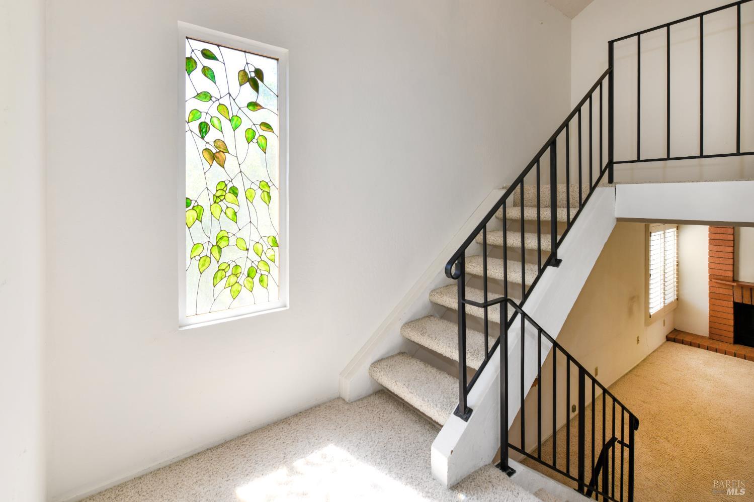 3007 Loma Court Santa Rosa, CA 95405 - Photo 14 of 43 Stairs leading to upper bedroom with walk in closet. Lovely window covering to create ambiance and privacy.