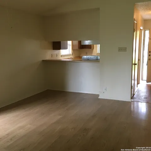 a view of a kitchen with a sink
