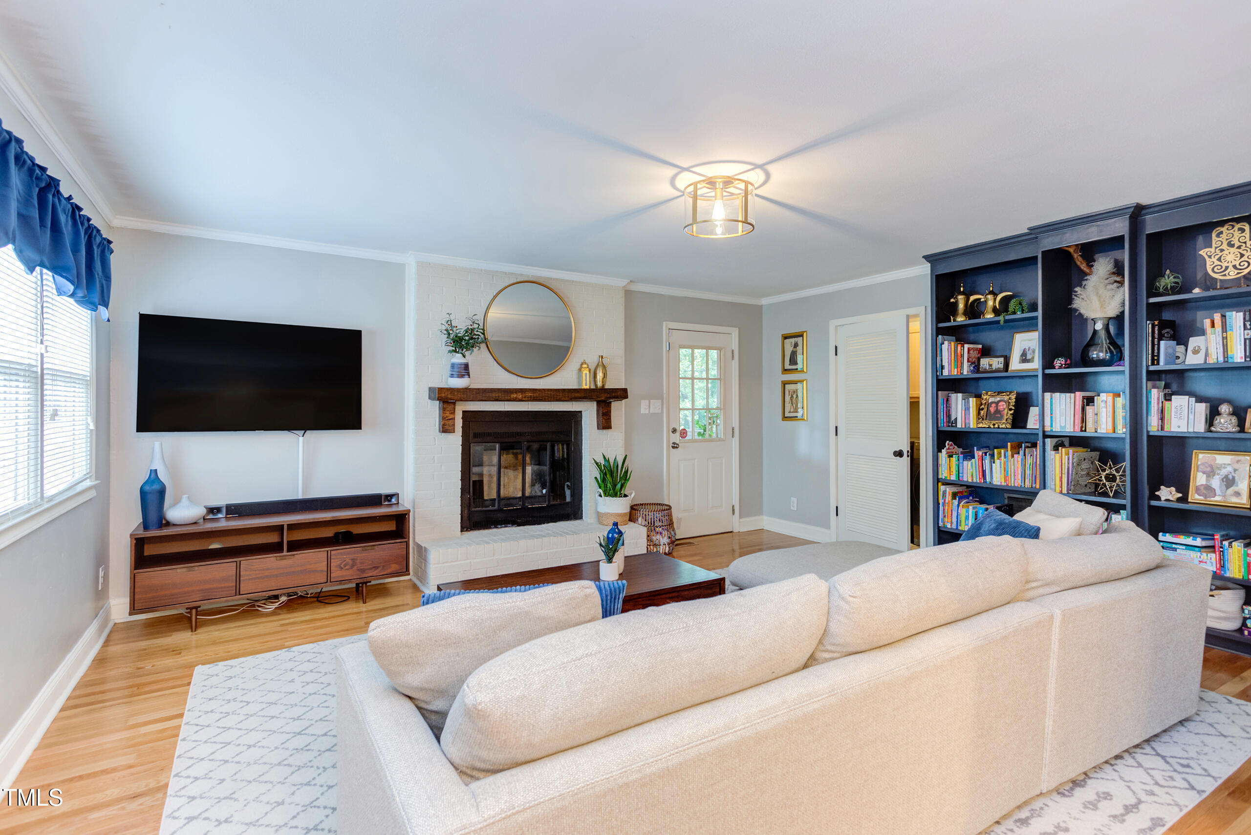 2256 Rumson Road Raleigh, NC 27610 - Photo 11 of 29 Open Family Room with Masonry Fireplace