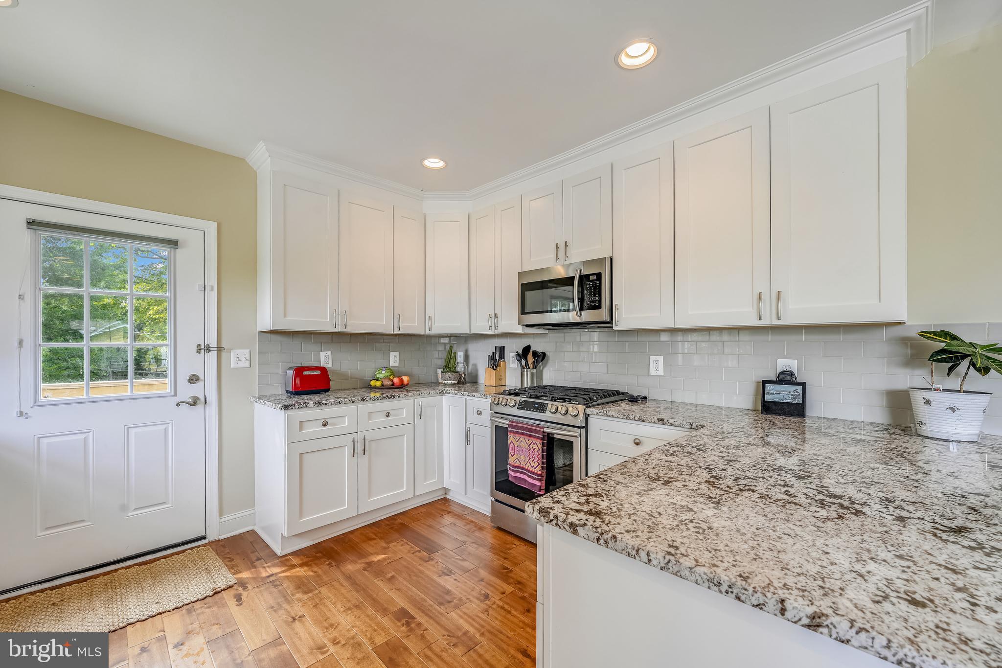 6506 Maplewood Road Baltimore, MD 21212 - Photo 10 of 36 Door to deck off of kitchen