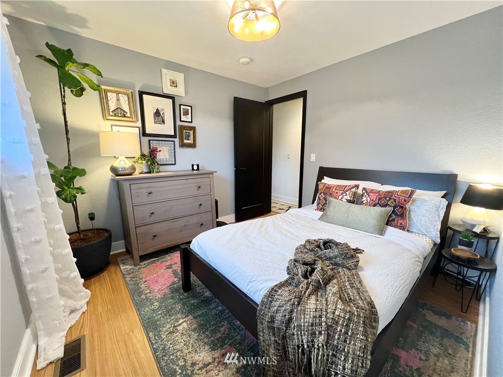 718 222nd Street Southwest Bothell, WA 98021 - Photo 13 of 22 a bed room with a bed and a dresser