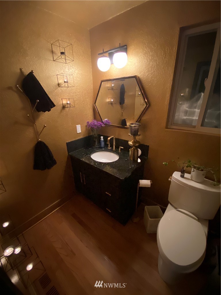 718 222nd Street Southwest Bothell, WA 98021 - Photo 17 of 22 a bathroom with a sink and a mirror